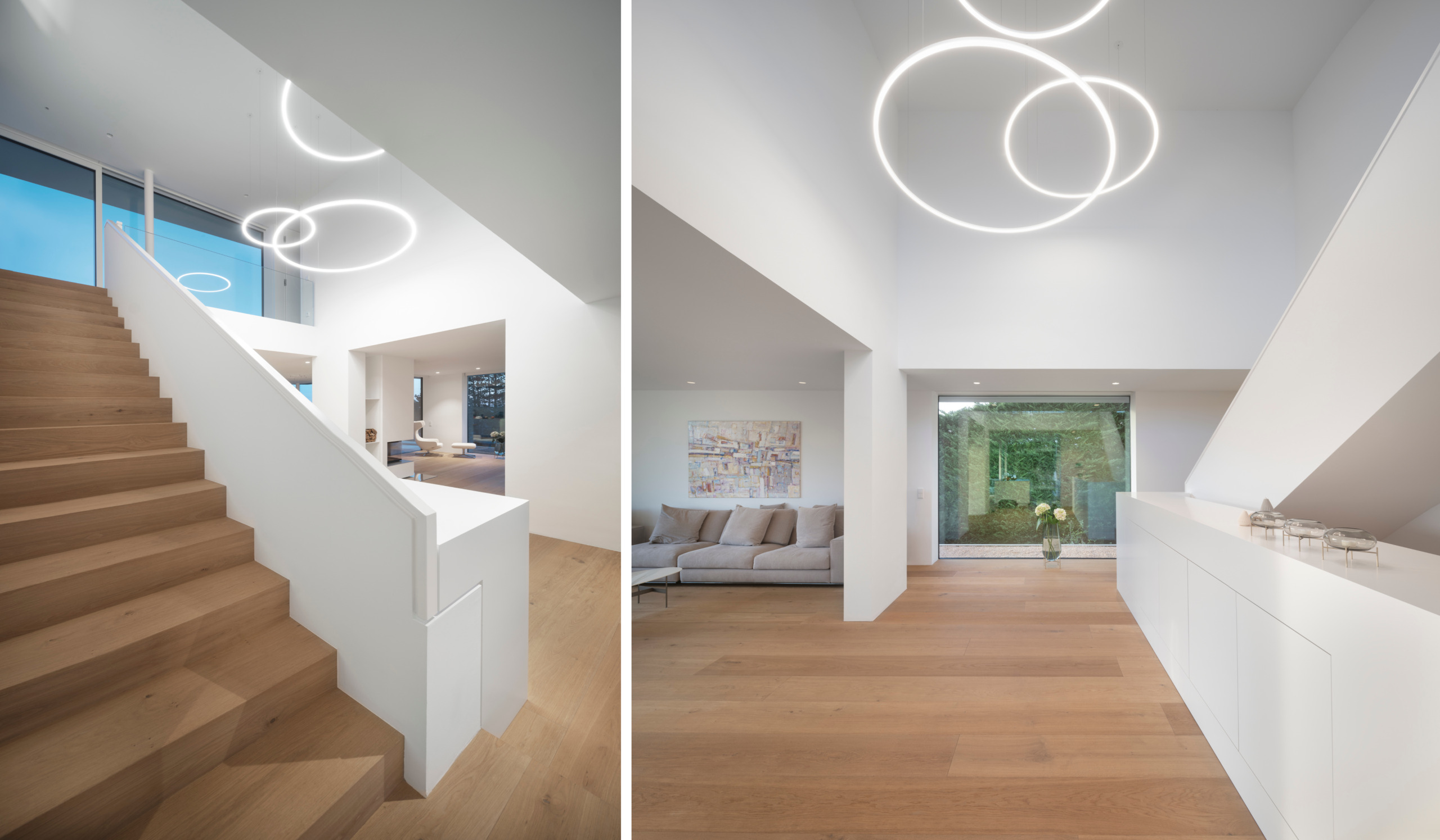 Villa in Wiesbaden Innenasicht Wohnbereich und Treppe mit runden Haengeleuchten scaled